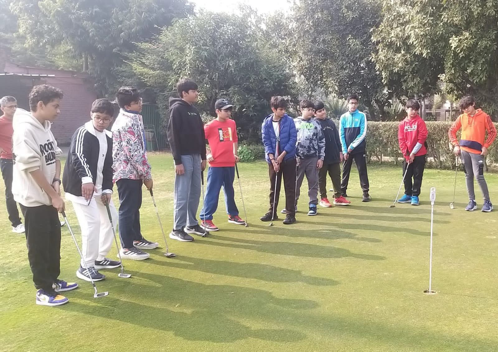 Students learning golf